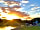 Wild Combe Camping: Struttons reservoir at sunset