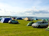 Large tent field with sea views. No set pitches so you choose where you go. Large tent field with sea views. No set pitches so you choose where you go.