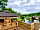 Calloose Caravan Park: Another picture of the peaceful seating area overlooking the site, next to the entrance of the NT.