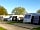 Argae Hall Caravan Park: Hardstanding pitch with touring caravan and awning (photo added by manager on 12/10/2021)