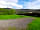 Church Stile Farm Holiday Park: Hardstanding pitch with lovely views of the farm and mountains