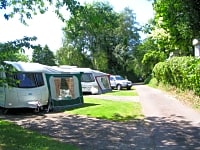 Hardstanding area with grass, ideal for awnings Hardstanding area with grass, ideal for awnings