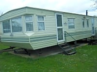 #14 stationær campingvogn 3 soveværelser (superior)