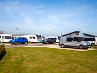 Lower Touring Caravan Super Pitches - All weather gravel pitches with electric, water, waste and TV. Lower Touring Caravan Super Pitches - All weather gravel pitches with electric, water, waste and TV.