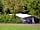 Vakantiepark Het Timmerholt: Grass pitches among the trees