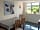 Churchbridge Glamping: Seating area in the kitchen (photo added by manager on 03/05/2022)