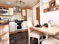 Kitchen and dining area Kitchen and dining area