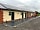 Stamford Way Fisheries and Camping: Shower block, reception and seating outside the café