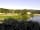 Camping La Grange Du Pin: Lake next to the site