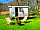 Church Stile Farm Holiday Park: Deckchairs and barbecue by the hut