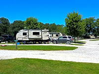 Sites with grass next to gravel drives Sites with grass next to gravel drives