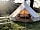 Heronshaw Meadow: Bluebell bell tent, with a pine-framed double bed, wingback armchairs and picnic table