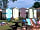 Chichester Lakeside Holiday Park: Lovely huts in the swimming area