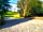 The Happy Pheasant Caravan Park and Campsite: Morning view towards the entrance at The Happy Pheasant