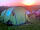 Quarry Lake Camping: Tent with the beautiful sunset in the distance (photo added by manager on 17/07/2021)