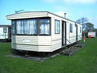 #26 stationær campingvogn 3 soveværelser