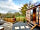 Lower Green Holidays: Hut exterior, with pizza oven and hot tub
