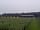 Black Barn Farm: Barn and wood behind the pitches lit at night (photo added by manager on 06/07/2021)