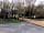 Orchard Park Touring Caravan and Camping: Entrance to an acre and a half of orchard with apple trees, plum trees and pear trees
