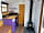 Newlands Hall: Compact kitchen and woodburner (photo added by manager on 16/05/2020)