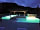Camping Le Port de Lacombe: Pool at night