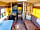 American School Bus Glamping at Isle of Wight: Living space (photo added by manager on 02/02/2023)