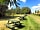Morelands Copse Camping: Grass pitch area with picnic tables
