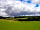 Dunn Street Farm: Northerly view across Bank Field, Hanger Wood and Bourne Wood to Hill Field