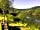 Huntsham Bridge Camping: Willow bench overlooking the Wye river