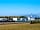 Harbour Side Caravan Site: Scottish hills and the lights as a back drop (photo added by manager on 02/07/2018)