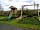 Well Farm: Nest swing and childrens fort with slide