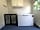 Starlit Glamping at Croydon Hall: Fridge/Freezer and storage space