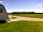 Harbour Lights Campsite: Field with toilet block in the distance