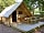 Camping des Pins: Decking with picnic table