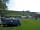 Usha Gap Campsite: The farm and facilities, from my pitch (following heavy rain, hence the track marks, but it was ok).