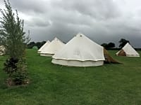 Our bell tent section with kitchen tent to the right Our bell tent section with kitchen tent to the right