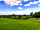 Hendre Farmhouse Orchard Campsite: Views down the site