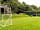 Lower Coombe Royal Glamping: Play area with trampoline and football goals
