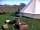 Far Acre Farm: Included with the glamping bell tent are a firebasket, wood, gas cooker and outdoor table and chairs