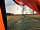 Pitch on the Wall Campsite: View from a tent over the pitches