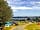 Nodes Point Holiday Park: View of the camping field and beach (photo added by manager on 18/07/2022)