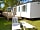 Camping Le Raguenes Plage: Exterior with decking and loungers