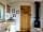 Sussex Meadow Shepherd's Huts: Kitchen area with woodburner (photo added by manager on 19/08/2022)