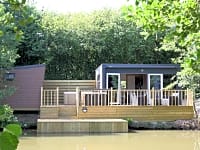 Pochard blokhut (aan het water, hot tub, voor families)