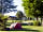 Camping Le Nid du Parc: Grassy pitches with plenty of greenery
