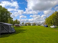 Grass pitches surrounded by trees Grass pitches surrounded by trees