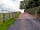 Herons Bank Caravan and Camping Site: Site entrance with electric security gate