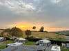 Widdicombe Farm Touring Park: Widdicombe Farm Touring Park in the evening (photo added on 08/03/2024)