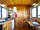 Trenewydd Farm: Kitchen and dining area, with door to bathroom.