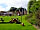 The Old Bush: Pretty gardens with play area (photo added by manager on 01/07/2019)